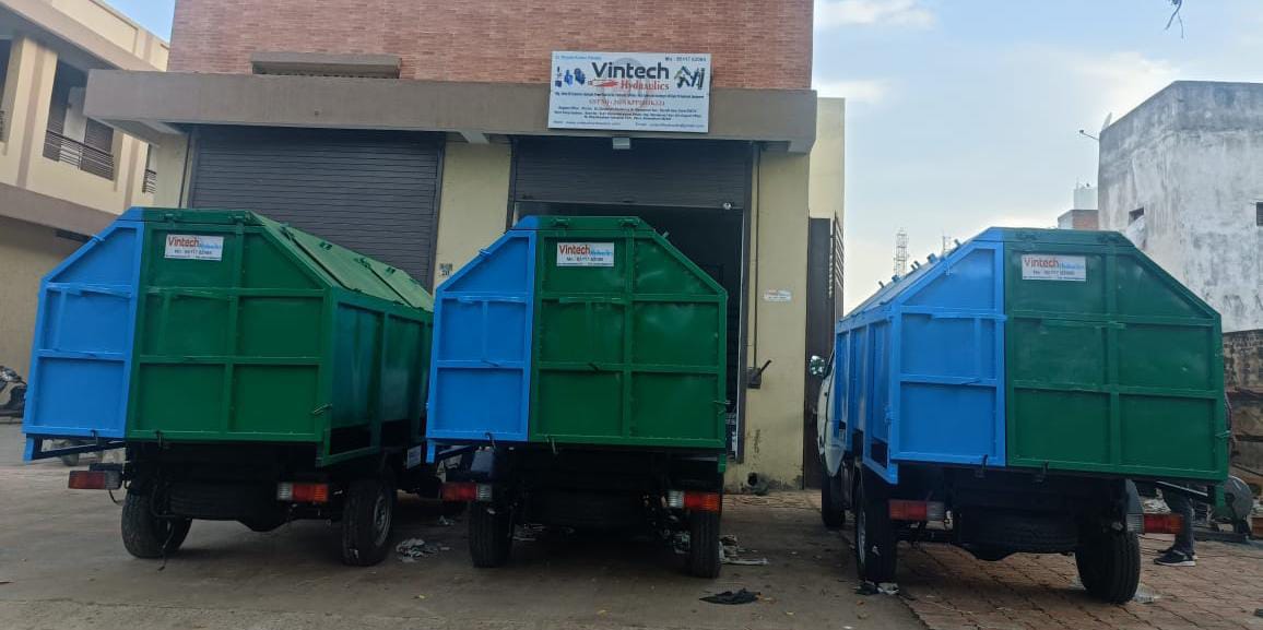 Garbage bin tilting system India